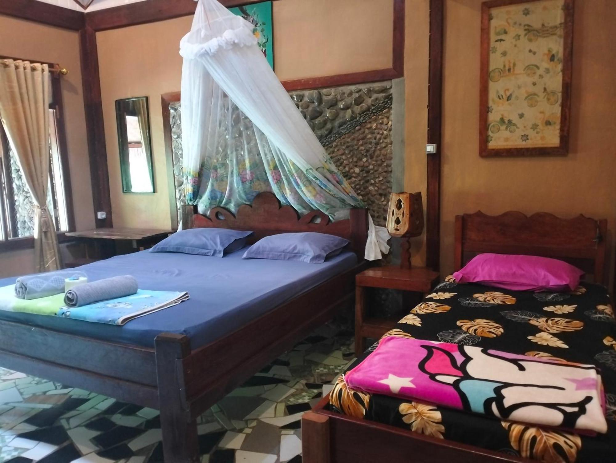 Junia Guesthouse Bukit Lawang Exterior foto